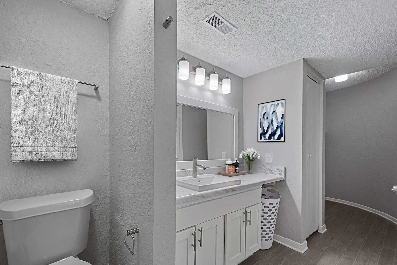 BAthroom with white cabinets